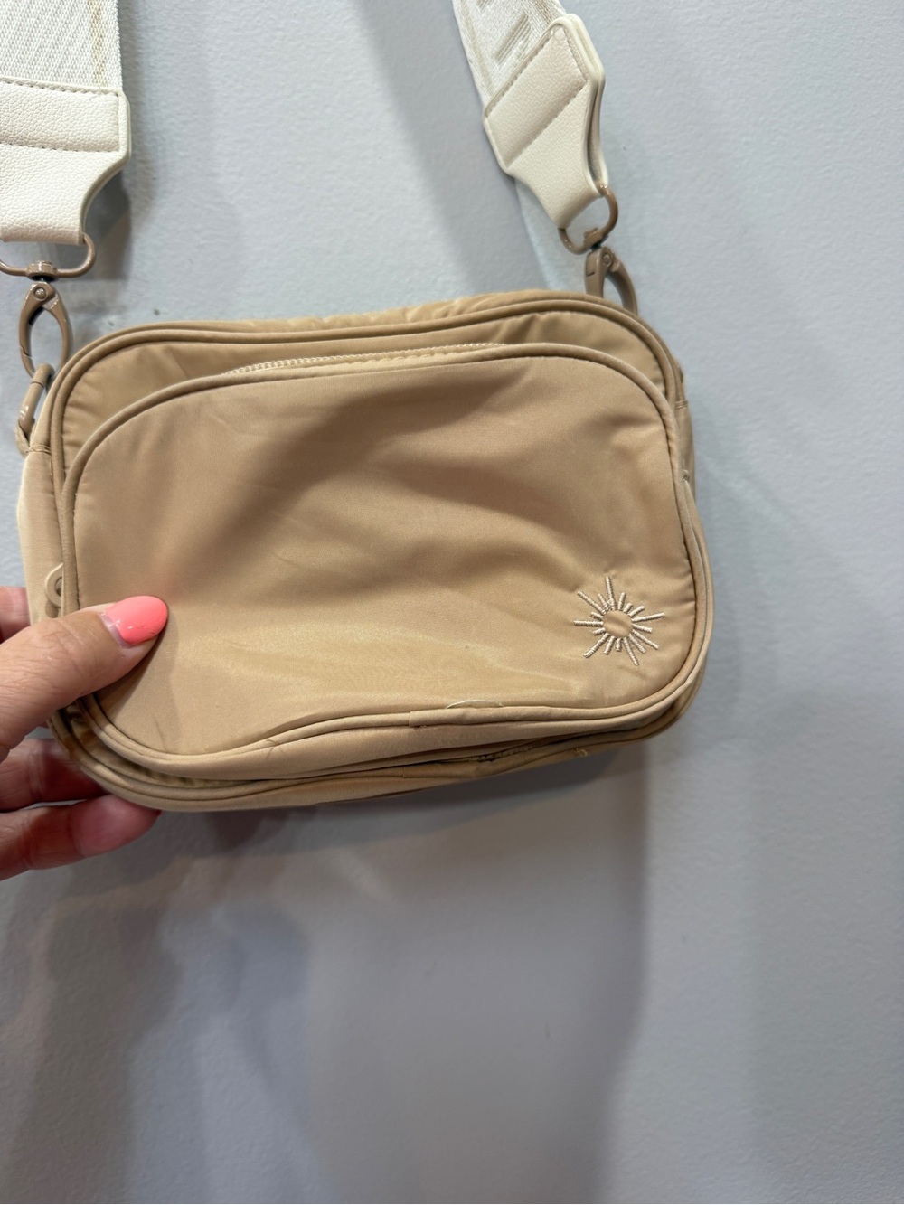 aerie Beige Crossbody with Cream Strap and Sunburst Detail